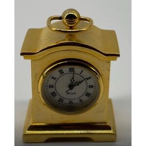 Miniature Gold Tone Quartz Clock With Roman Numerals